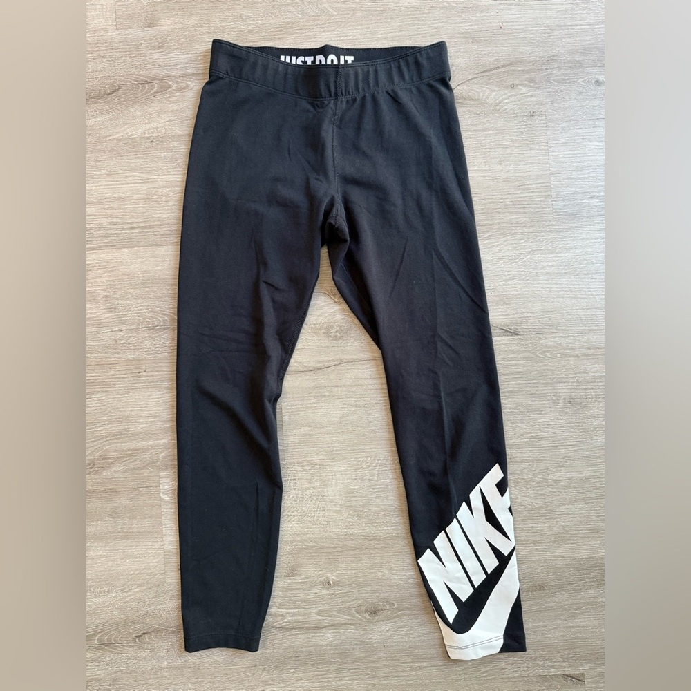 Nike women’s Black Leggings with White Logo size small